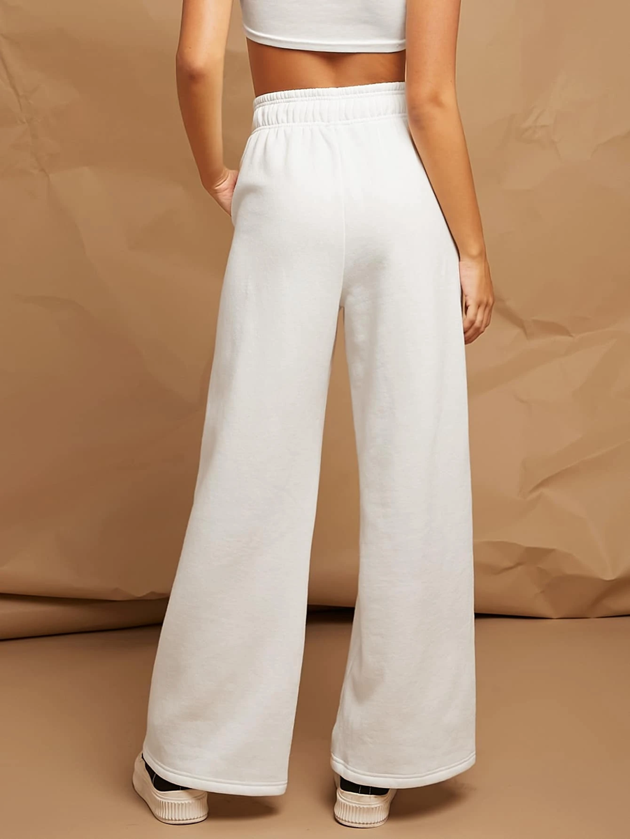 white broad pants with front pleat for athleisure