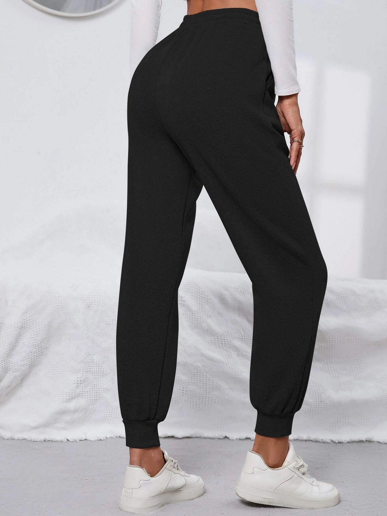 Women Regular Fit Black Printed Trousers